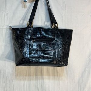 Mora Mara leopard print inside and alligator type design material on outside‎